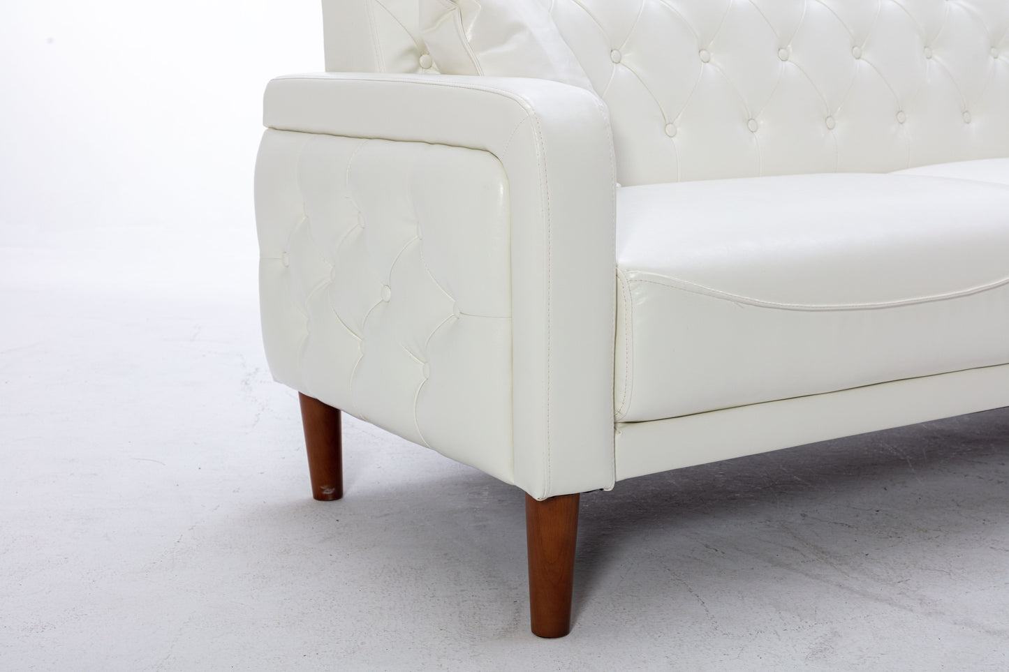 2047 Ivory Tufted Faux Leather Sofa House to Home Furnishings LLC