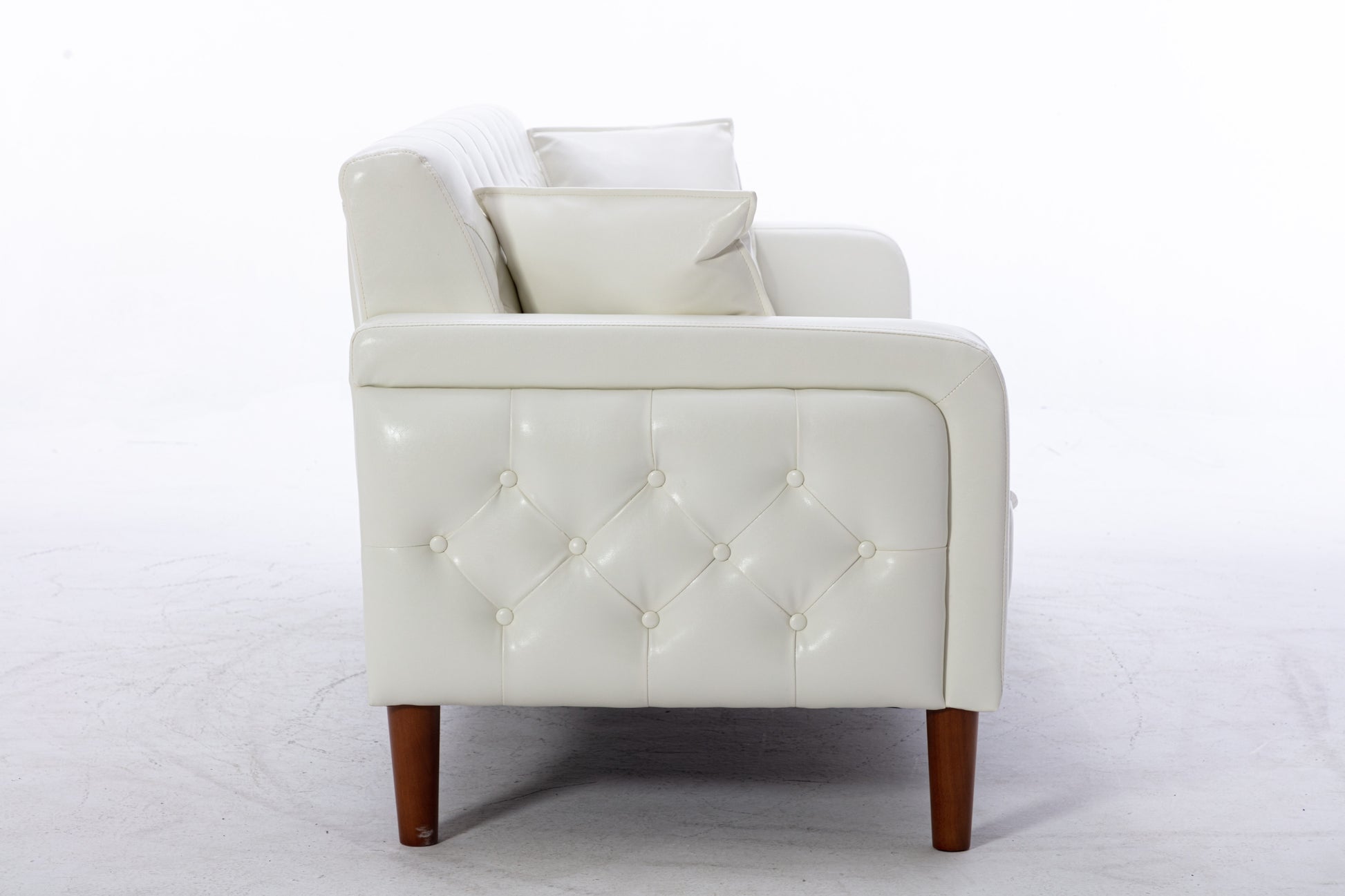 2047 Ivory Tufted Faux Leather Sofa House to Home Furnishings LLC