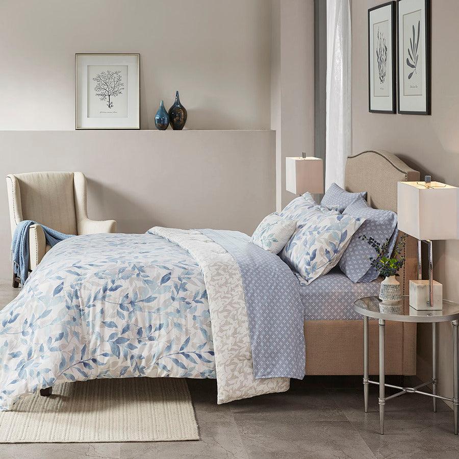 Sofia Reversible Transitional Complete Bedding Set Blue Twin Olliix.com